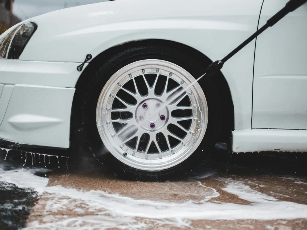 Best Car Wash Lakeforest Of Kelliwood high-quality car cleaning service for a white car in action.