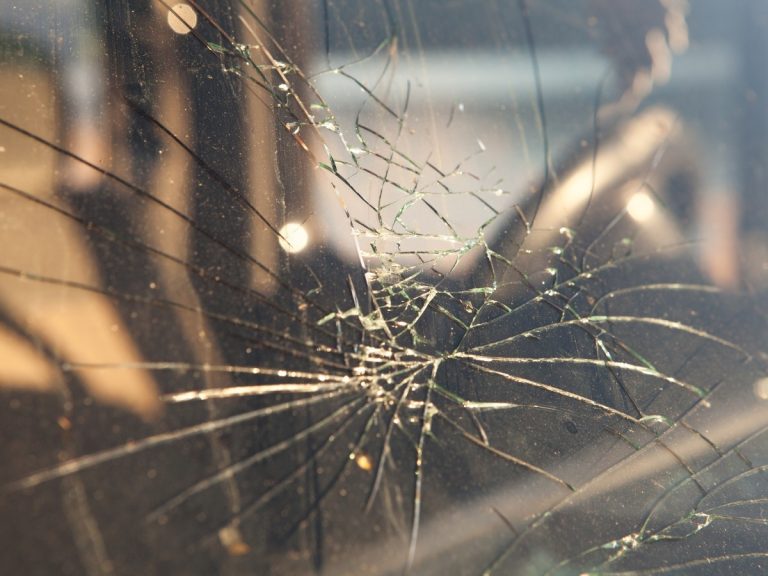 cracked glass on a vehicle, detailing and repair services, car wash in Katy TX